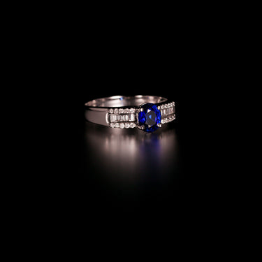 0.93ct natural blue sapphire ring in 18k white gold with diamond accents